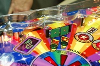 Image # 36252: Wheel Of Fortune Early Production on Assembly Line 
(Images 36235 through 36269 show one of the first ten or so games being assembled at the factory. Some playfield parts may have not yet been installed on this playfield.)