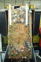 Image # 36256: Wheel Of Fortune Early Production on Assembly Line 
(Images 36235 through 36269 show one of the first ten or so games being assembled at the factory. Some playfield parts may have not yet been installed on this playfield.)