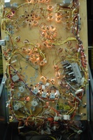 Image # 36258: Wheel Of Fortune Early Production on Assembly Line 
(Images 36235 through 36269 show one of the first ten or so games being assembled at the factory. Some playfield parts may have not yet been installed on this playfield.)