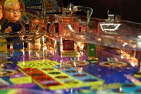 Image # 36262: Wheel Of Fortune Early Production on Assembly Line 
(Images 36235 through 36269 show one of the first ten or so games being assembled at the factory. Some playfield parts may have not yet been installed on this playfield.)