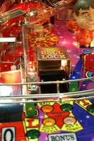 Image # 36263: Wheel Of Fortune Early Production on Assembly Line 
(Images 36235 through 36269 show one of the first ten or so games being assembled at the factory. Some playfield parts may have not yet been installed on this playfield.)