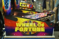 Image # 36269: Wheel Of Fortune Early Production on Assembly Line 
(Images 36235 through 36269 show one of the first ten or so games being assembled at the factory. Some playfield parts may have not yet been installed on this playfield.)