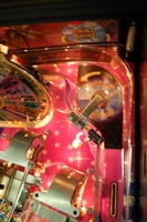 Image # 36238: Wheel Of Fortune Early Production on Assembly Line 
(Images 36235 through 36269 show one of the first ten or so games being assembled at the factory. Some playfield parts may have not yet been installed on this playfield.)
