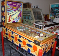 Image # 28274: Classy Bowler Cabinet - Left 
(Gottlieb data does not support that this game was built with wooden legs. The manufacturer's flyer shows metal legs.)