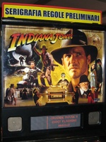 Image # 42300: Indiana Jones Sample Game - Illuminated Backglass 
(Backbox topper reads 'preliminary graphics and game rules'. Serial number E 216297.)