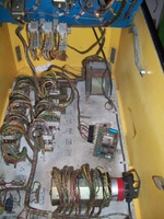 Image # 45930: Fantastic World Inside Cabinet 
(The cylindrical motor is shown here. Nearby is an unplugged sound board awaiting repair.)