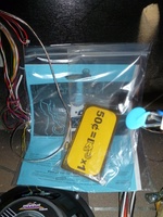 Image # 55795: Disney TRON Legacy (Limited Edition) Goodie Bag 
(This bag is provided with each game and contains the game manual, spare plastics, bulbs, and fuses. Serial number 230914.)