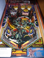 Image # 40689: Cosmic Gunfight Orange Version Playfield 
(The owner of this game states he has clearcoated the playfield and applied reproduction drop target stickers.)