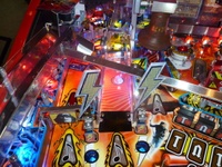 Image # 52345: AC/DC (Let There Be Rock Limited Edition) Upper Left Playfield 
(The playfield has been raised in this image. Serial number 234387.)