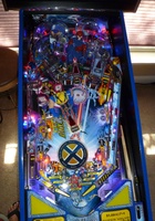 Image # 55817: X-Men Wolverine LE Playfield 
(All playfields are manufactured with the designer's signature below the right flipper. Serial number 235748.)