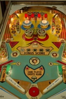 Image # 50837: Cowboy Playfield 
(This game has light shields colored red and green. The flippers on this playfield are reversed, causing the printing to be upside down.)