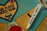 Image # 50839: Cowboy Jumbo Flipper 
(The flippers on this playfield are reversed, causing the printing to be upside down.)