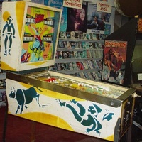 Image # 12202: Cowboy Cabinet - Left 
(This game has light shields colored two-tone green.)