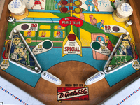 Image # 78454: Cross Town Sample Game - Lower Playfield 
(A thin polycarbonate sheet has been placed on this playfield to protect it from further wear. Serial number 01017 S.)
