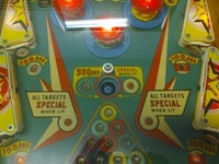 Image # 56436: Cue Ball Middle Playfield 
(The white target and the green and yellow pop bumper platters are not original to this game.)