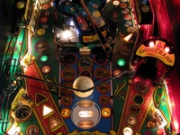 Image # 47839: Cue Ball Wizard Illuminated Middle Playfield 
(The center plastic belonging under the pivoting ball shooter is missing from this game.)