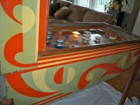 Image # 39868: Cyclone Cabinet - Left 
(The game flyer shows that both flippers are supposed to be white. Serial number 053123C.)