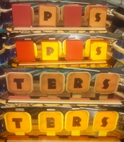 Image # 62977: Cyclopes OPES and TERS Targets 
(Photographs made with and without camera flash are compared here to inform about color. Two drop target stickers are missing. Serial number 5882.)