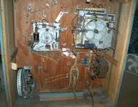 Image # 61924: C.O.D. Inside Backbox 
(Just to the right of the replay unit, a bell assembly is missing. On the stepper unit above that empty space, a second bell is missing, showing only its clapper.)