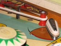 Image # 46379: Alpine Club Right Side Missing Lamp Socket 
(Under the playfield, the flipper end-of-stroke switch required the space where the light socket would be. Serial number 19514.)