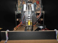 Image # 69418: The Big Lebowski� Pinball (First Model) Bowling Mechanism - Underside 
(This view was photographed through the front doorway.)