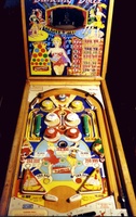 Image # 7279: Dancing Dolls Cabinet - Front View 
(The lamp for the backglass animation can be seen in this image.)