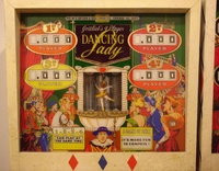 Image # 34722: Dancing Lady Sample Game -  Backglass 
(Besides having multiple colors around the score reels, this glass, and the Sample backbox, were slightly shorter than the production version.)