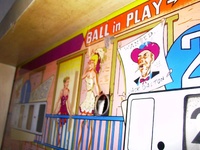 Image # 24930: Dodge City 2nd Player - 'Jack Dalton' 
(Plexiglas backglass. This game from Germany shows where vandals had cut the backglass to gain access to the replay mechanism.)