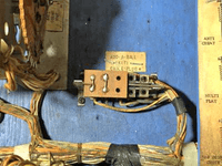 Image # 82798: Dogies Replay Mode Shorting Plug Installed 
(In the wood near the jack, two starter holes can be seen where the optional Add-A-Ball Relay Assembly would be mounted.)