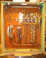 Image # 48479: Doodle Bug Inside Early Production Backbox 
(To the immediate left of the dummy score reel is a two-plug jack to select 3 or 5 balls. The option dial in the lower left corner selects either replay or add-a-ball operation. Serial number 65420.)