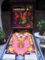 Image # 48485: Doodle Bug Early Production Illuminated Front View 
(The pop bumper caps and the yellow rollover button below the doodle bug are not original to this game. Serial number 65420.)