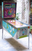 Image # 48486: Doodle Bug Early Production Cabinet - Full View 
(One leg was removed to highlight that the original pink cabinet color has faded to white on this game. Serial number 65420.)