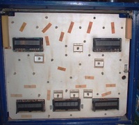 Image # 68464: Dragonfist Behind Backglass 
(We don't know if the tape strips were applied by the factory or not. Each cover a wired socket.)
