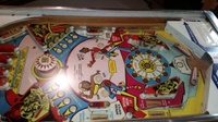 Image # 67915: Dyn O' Mite Playfield - Original Flippers 
(The original flippers have the exposed screw heads and washers.)