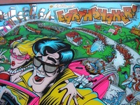 Image # 14357: Earthshaker Test Backglass 
(Screened on glass; not a translite. One of ten test backglasses with a pink car (production backglass features a red car), made shortly after the game went into production.  Were never put in any game.)