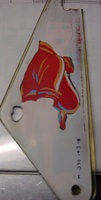 Image # 39419: Eight Ball Playfield Plastic - Reverse 
(Pinky Tuscadero's shirt on this slingshot plastic appears red when the game is on, and tan when the game is off.)