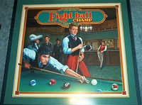 Image # 71150: Eight Ball Champ Original Backglass Artwork 
(Artist is Tony Ramunni.Watercolor on posterboard.Approximate dimensions 24 1/2 inches by 26 inches. Metal frame is 30 1/2 by 32 1/2 inches.)