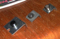 Image # 58840: Eight Ball Deluxe Prototype Game - Coil Stop Comparison 
(Left to Right: Williams WPC games, Bally production games, Bally prototype Eight Ball Deluxe. Reportedly, Bally 'Safecracker' used a similarly tapered plunger and coil stop in the backbox 'Magic Token' dispenser but the lengths are slightly different. Serial number EED9201.)