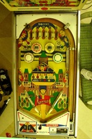 Image # 28847: Elite Guard Playfield 
(The bumper cap point values seen on this game were changed by the operator to account for his modification to 5-digit backglass scoring.)