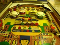 Image # 28848: Elite Guard Upper Playfield 
(The bumper cap point values seen on this game were changed by the operator to account for his modification to 5-digit backglass scoring.)