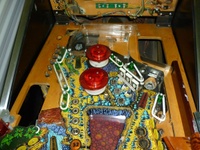 Image # 49217: Escape from the Lost World Upper Playfield Exposed  
(The elevated playfield has been hinged upward in this view.)