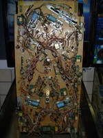 Image # 43689: F-14 Tomcat Prototype Game - Under Playfield 
(This game's MPU has prototype ROMs; their white stickers indicate PROTO5. Serial number 554 196508. )
