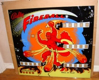 Image # 59225: Fireball NOS Backglass 
(This glass was described to us as New Old Stock. It was packed in its carton with Chicago newspaper dated 1974.)
