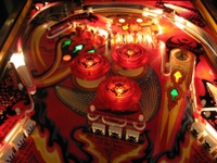 Image # 40269: Fireball II Illuminated Upper Playfield 
(The factory mylar has been removed from this playfield. The drop targets and bumper caps are after-factory manufacture using Bally's original dies.)
