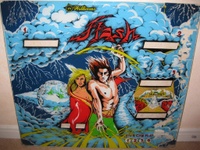 Image # 58458: Flash Prototype Blue Backglass 
(The sky is blue, not black. The designer autographed the upper left corner.)