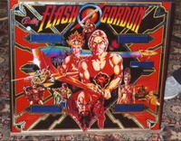 Image # 12140: Flash Gordon Early Production Backglass 
(This is from the game with serial number 1001, the first game produced.  Note the blue tinting where the score displays are located.)