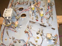 Image # 49155: Flight 2000 Under Middle Playfield 
(In this view, some hardware has been removed. Serial number 598. Edge of playfield dated 'June 12, 1980'.)