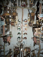 Image # 59461: Flipper Fair Sample Game - Lamp Sockets 
(The ten lamp sockets are individually mounted to the playfield. Serial number 55042 S.)