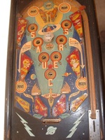 Image # 7871: Flying Saucers Playfield 
(This game has after-factory painted rails, apron, and ball arch but is presented here to show the white pop bumper cap not seen in other images.)