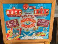 Image # 82718: Around the World Illuminated Backglass 
(The owner stated he has had this game since the early 1960s.)